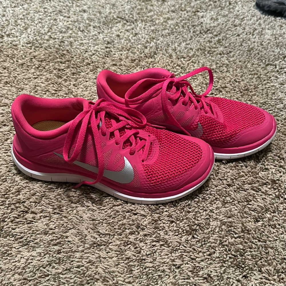 Pink Nike free sneakers